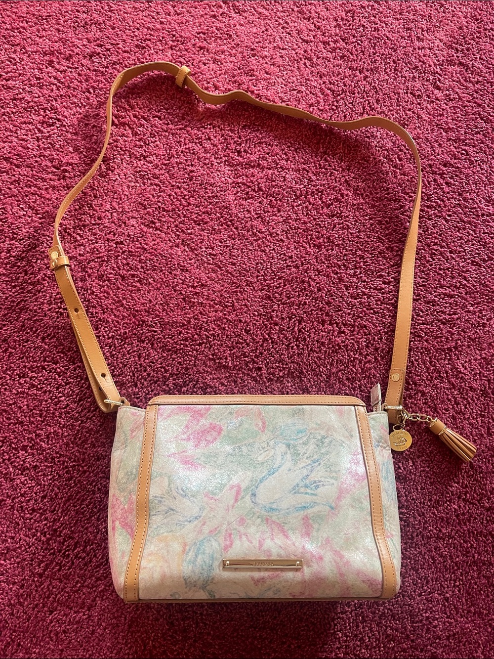 Brahmin crossbody with Tan Leather Trim. The purse is in very good condition.